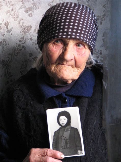 Vera Putina su šeimos nuotrauka, kurioje, kaip teigiama, yra jaunasis Vova