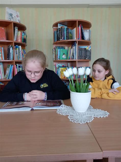 Studentas bibliotekoje