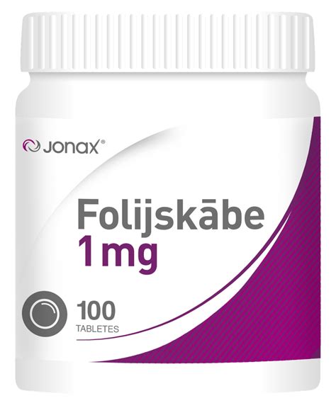 Folio rūgšties tabletės ir nėščios moters ranka