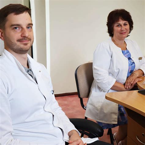 Gydytojų komanda, bendraujanti su pacientu