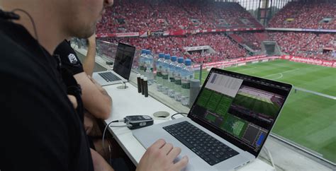 Football player analyzing match statistics