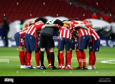 Football team huddle discussing tactics