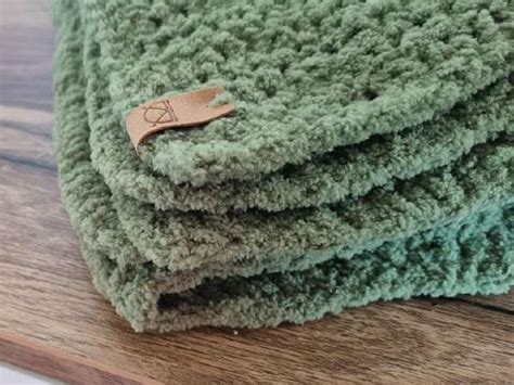 Vąšeliu nertas pledas naujagimiui