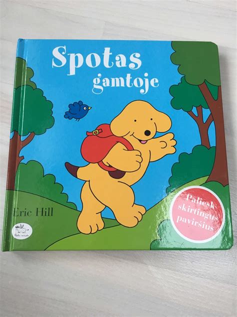 Šuniukas tyrinėja skirtingus paviršius