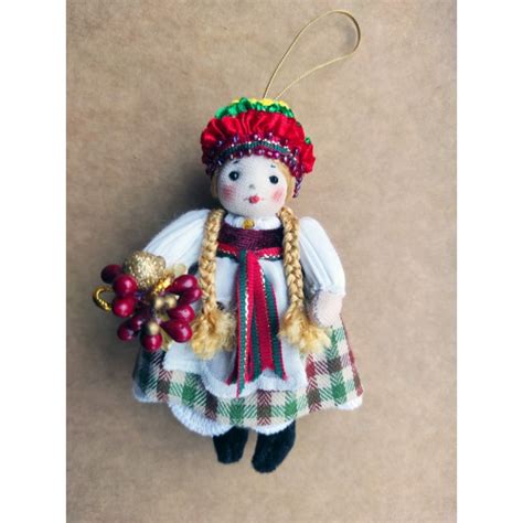 Rankų darbo lėlė su tautiniais drabužiais