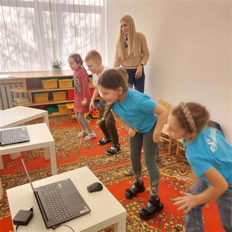 Vaikai, pristatantys pranešimus konferencijoje