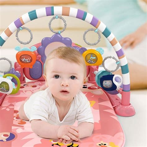 Vaiko lavinimo kilimėlis su žaislais