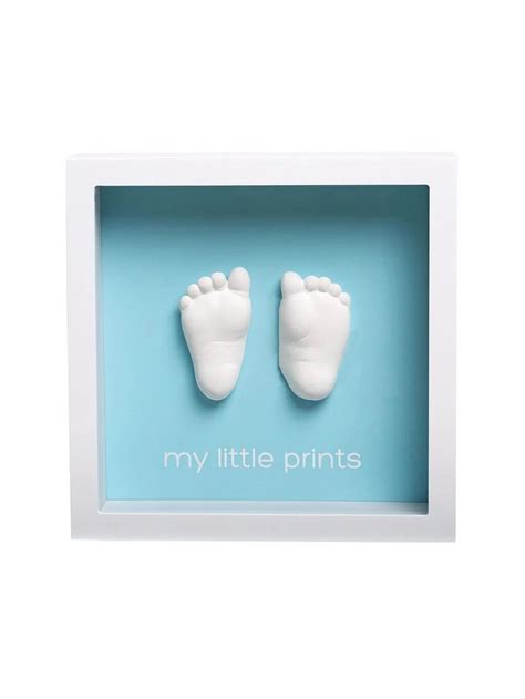 stilingas kūdikio atspaudų rėmelis ant sienos