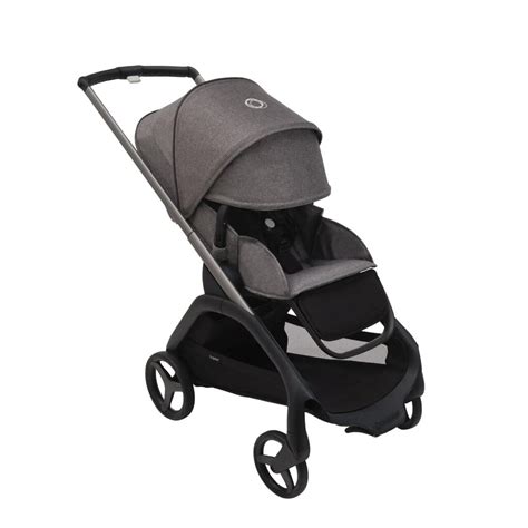 Nuotrauka, kurioje matosi Bugaboo vežimėlis su dideliais žieminiais ratais