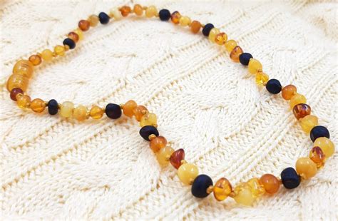 Vaikiški gintaro karoliai