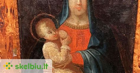 Motina, žindanti kūdikį