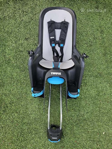Thule dviračio kėdutė su vaiku