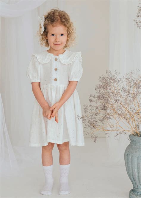 mergaitės krikšto suknelės aksesuarai: galvajuostės ir papuošimai