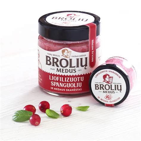 Perspėjimo ženklas su spanguolėmis