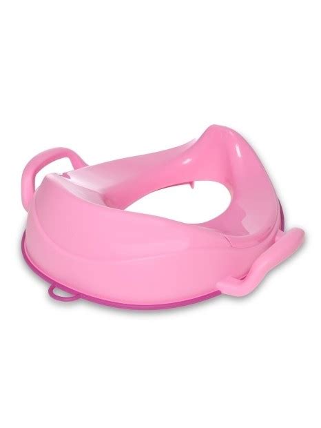 Vaikas savarankiškai lipantis ant tualeto su trenerio pagalba