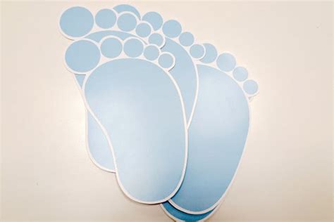 kūdikio pėdutės įspaudas molio rėmelyje