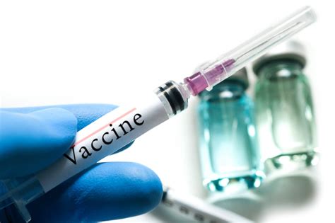 Vėjaraupių vakcinos buteliukas ir švirkštas