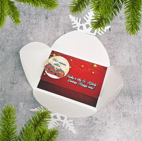 Vaizdas su pinigų vokeliu ir širdimi