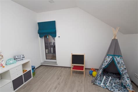 Senelių namų jaukus kambarys