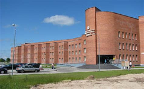 Šiuolaikinė Moters ir vaiko klinikos Šiauliuose pastato fasado nuotrauka