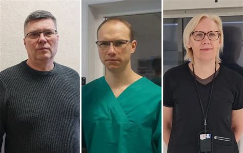 Grupės medikų portretas ligoninės aplinkoje