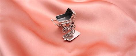 sidabriniai dirbiniai krikštynoms