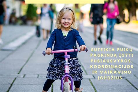 vaikas ant balansinio dviračio