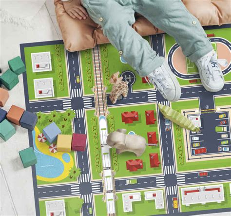Vaikiškas kilimėlis su gyvūnų ir miesto kelio raštais