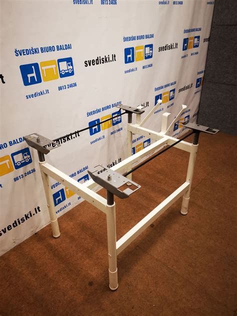 reguliuojamo aukščio lovytės mechanizmas