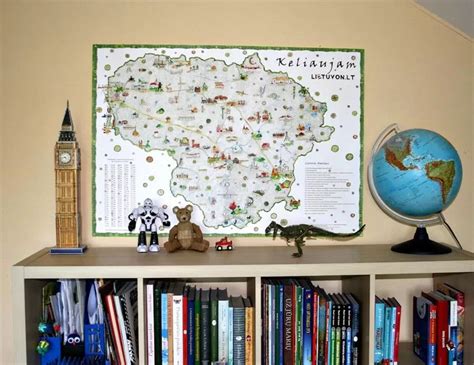 Vaikas su Lietuvon.lt interaktyviu kelionių žemėlapiu