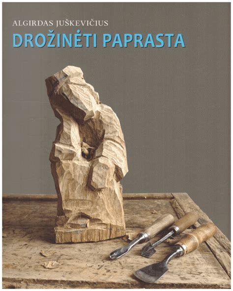 Algirdas Juškevičius su mokiniais drožybos studijoje