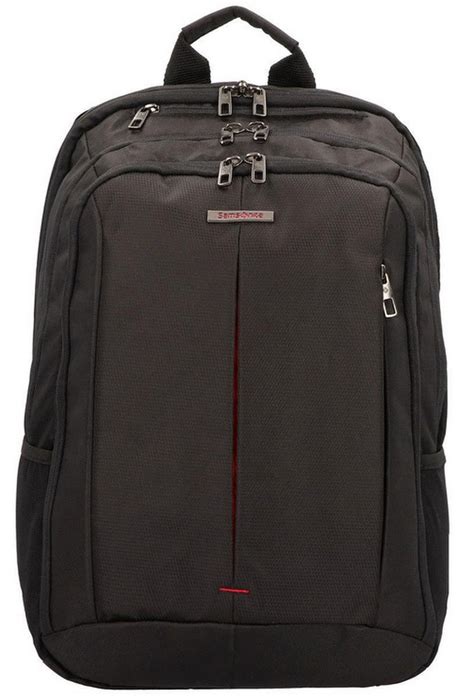 Mokinys su kokybiška Samsonite kuprine prie mokyklos