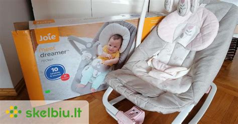 Vibracinė kėdutė-gultukas su kūdikiu