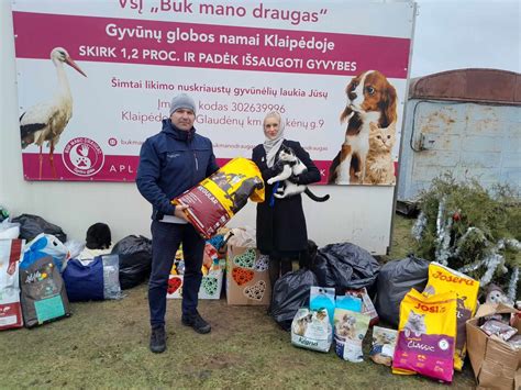 Gyvūnų globos akcija ir žmonės besirūpinantys gyvūnais