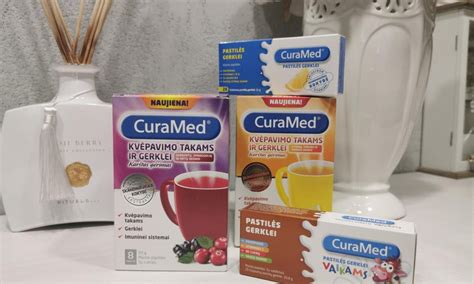 „CuraMed“ pastilių pakuotė ir jų sudėtyje esantis karvių priešpienis