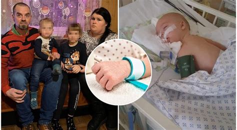Motina apkabina savo sergantį vaiką ligoninėje